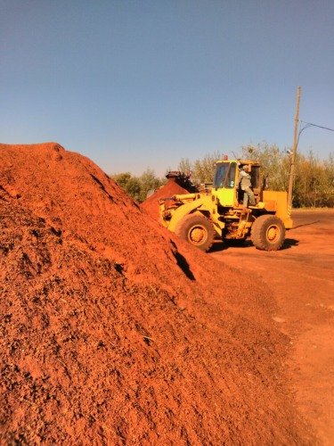 Bulk topsoil being moved by front loader